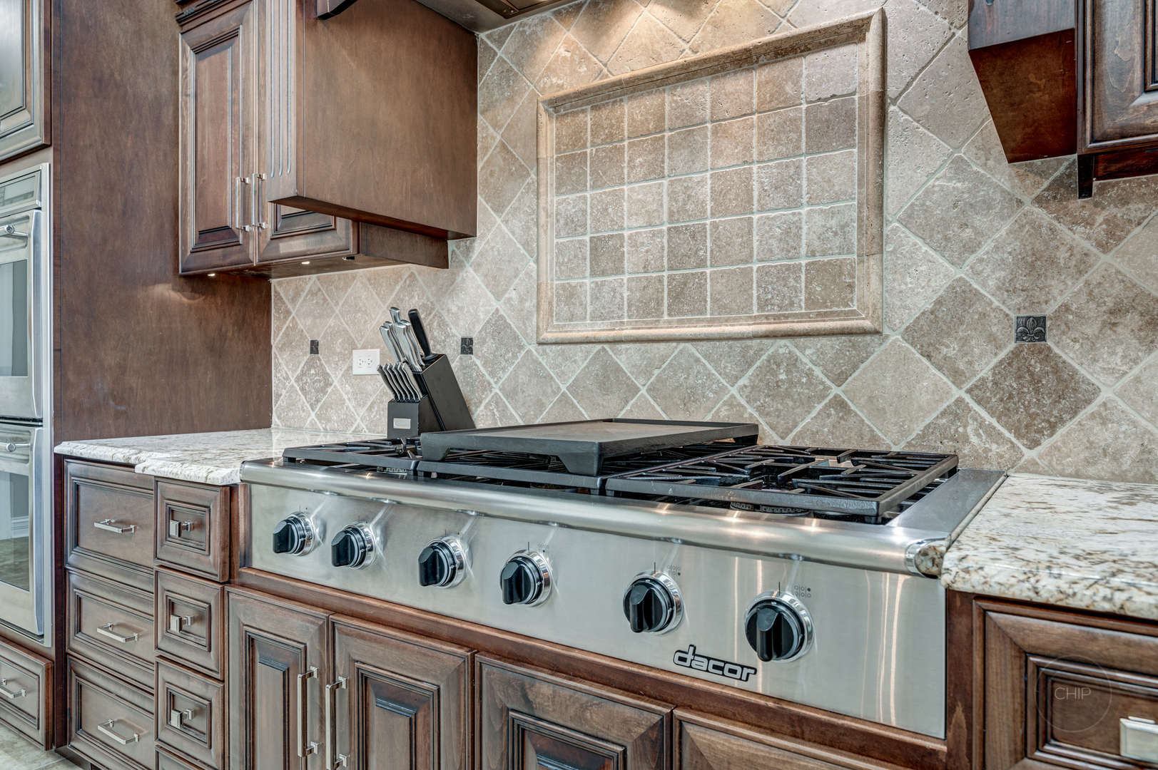 4603 Corktree Road Naperville, IL 60564 - Photo 19 of 61 a stove top oven sitting inside of a kitchen