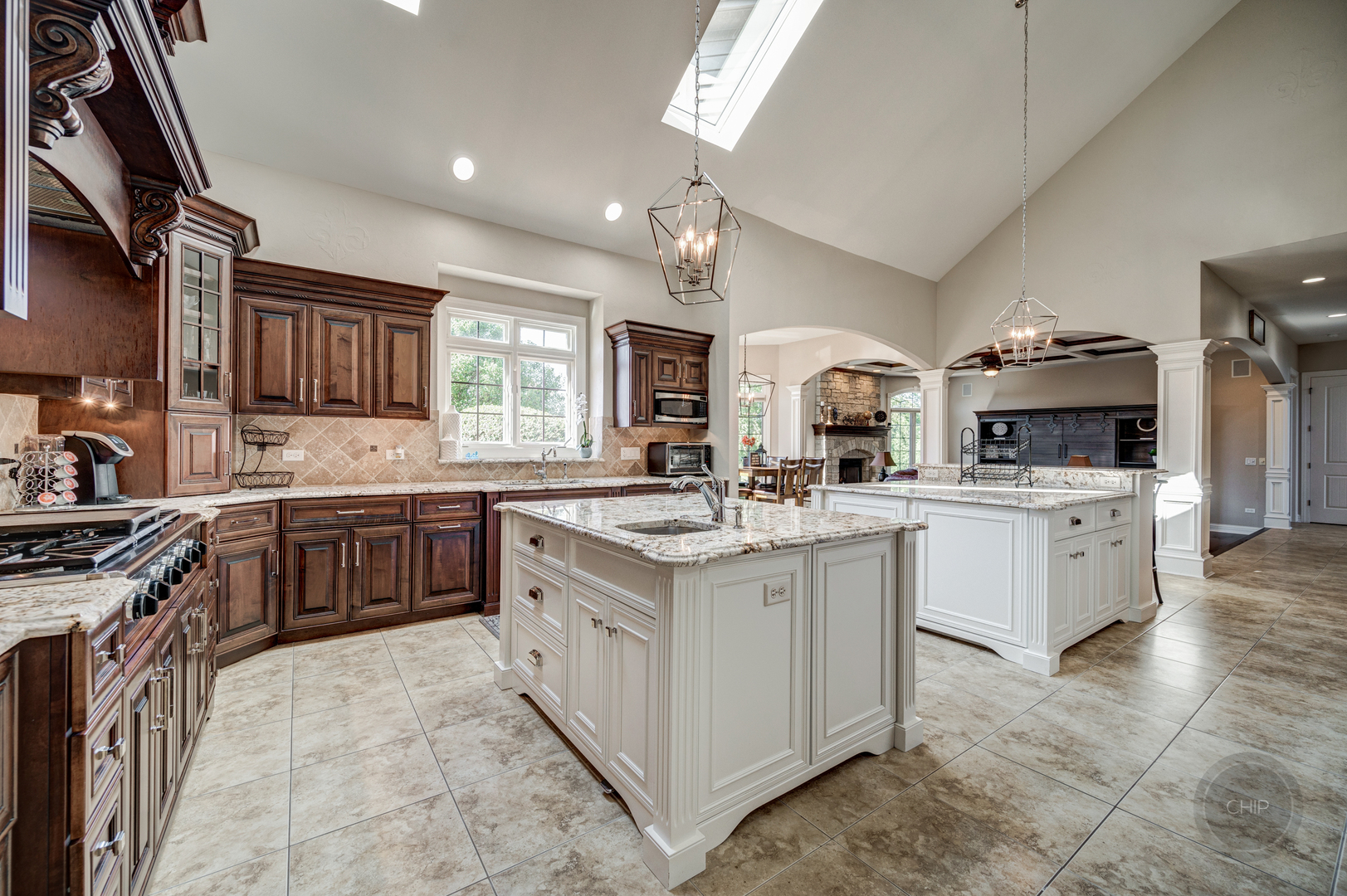 4603 Corktree Road Naperville, IL 60564 - Photo 20 of 61 a kitchen with granite countertop a sink stove top oven and cabinets