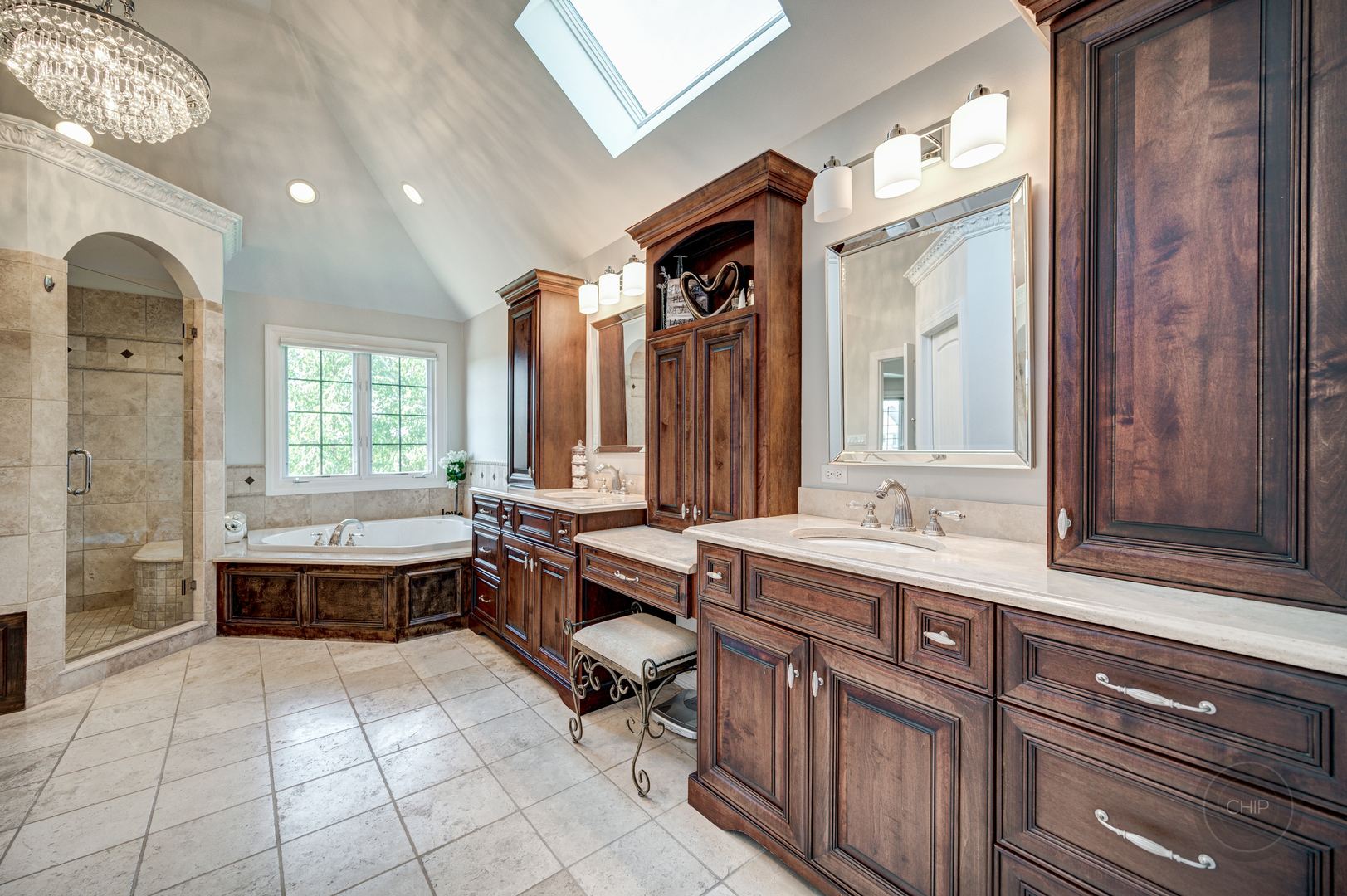 4603 Corktree Road Naperville, IL 60564 - Photo 32 of 61 a spacious bathroom with a bathtub sink and mirror