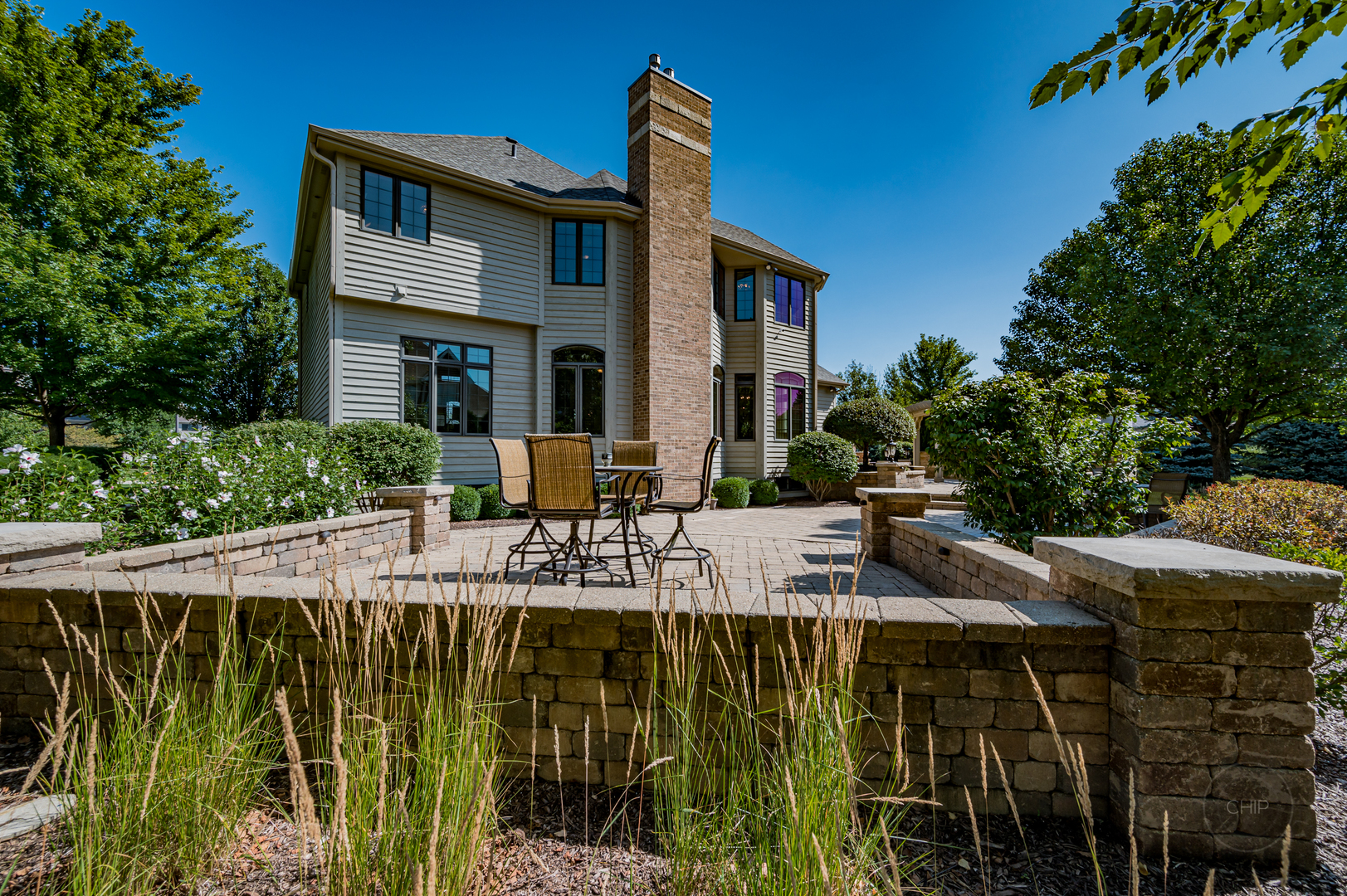 4603 Corktree Road Naperville, IL 60564 - Photo 53 of 61 a view of house with patio outdoor seating area