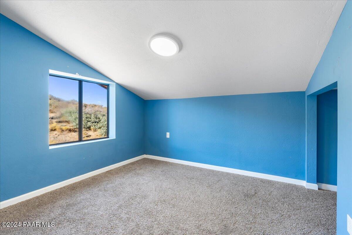 17400 Round Mountain Road Dewey, AZ 86327 - Photo 24 of 25 an empty room with windows