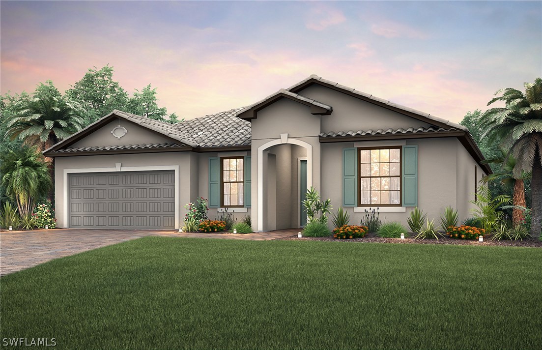 2332 Orchard Street Naples, FL 34120 - Photo 1 of 1 a front view of a house with garden