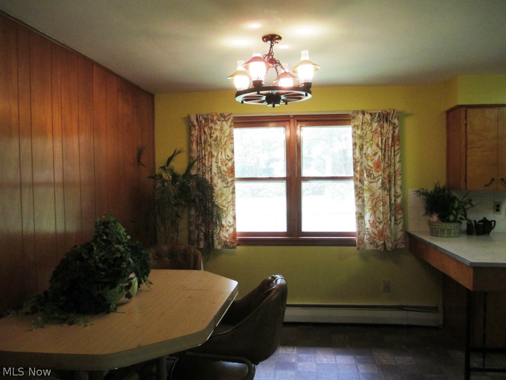 12154 West Ridge Road Oberlin, OH 44074 - Photo 9 of 24 Dining area has double windows to enjoy the view.