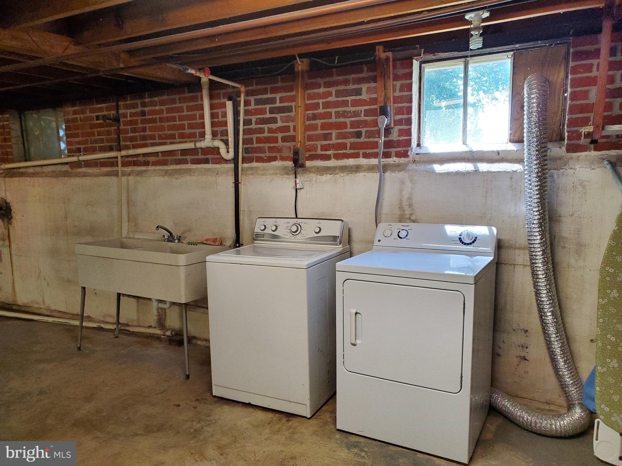 30255 Mt Vernon Road Princess Anne, MD 21853 - Photo 38 of 55 Basement Laundry with Sink