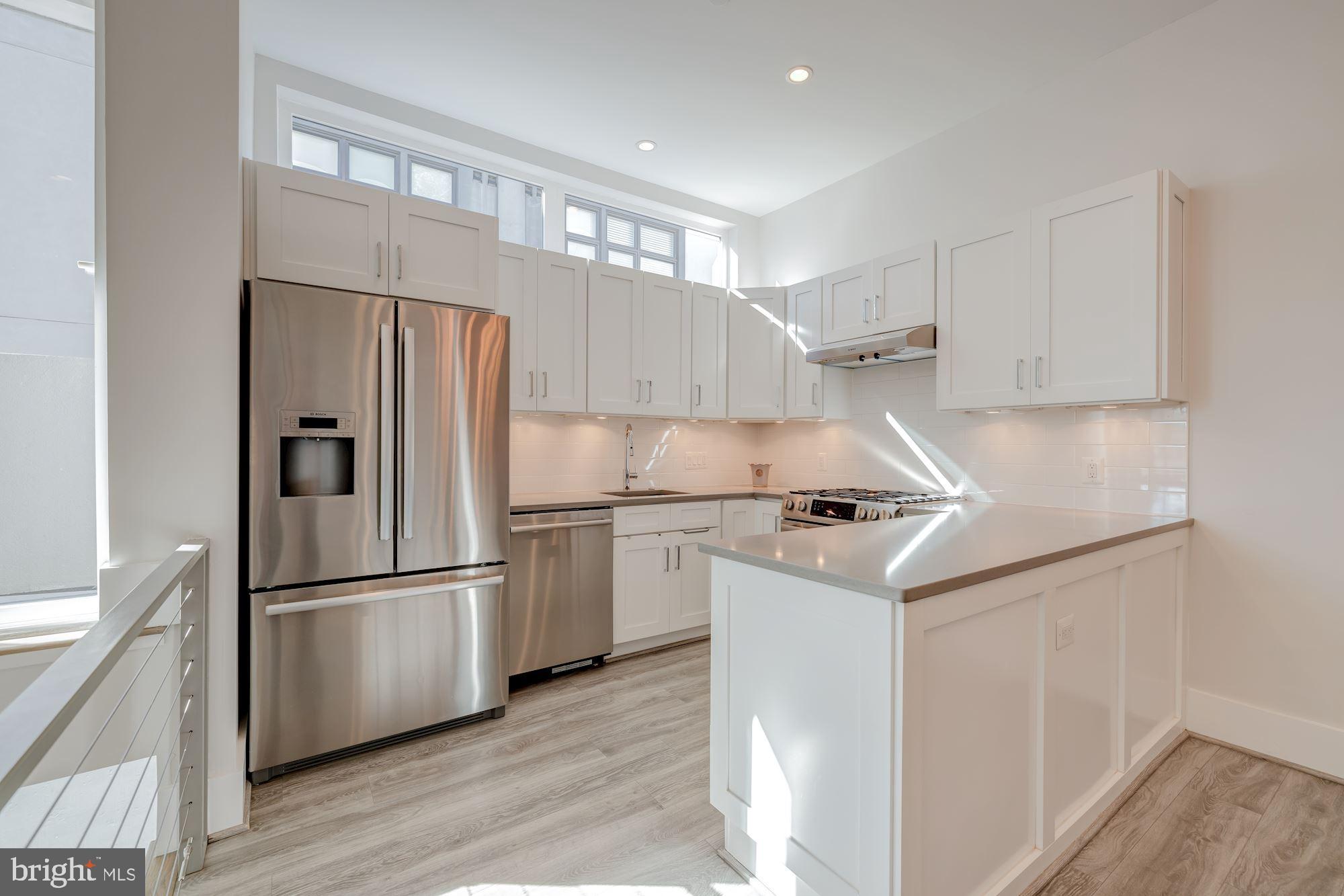 3915 Fulton Street Northwest, Unit 1 Washington, DC 20007 - Photo 13 of 33 Kitchen w/ Bosch appliances & warming draw