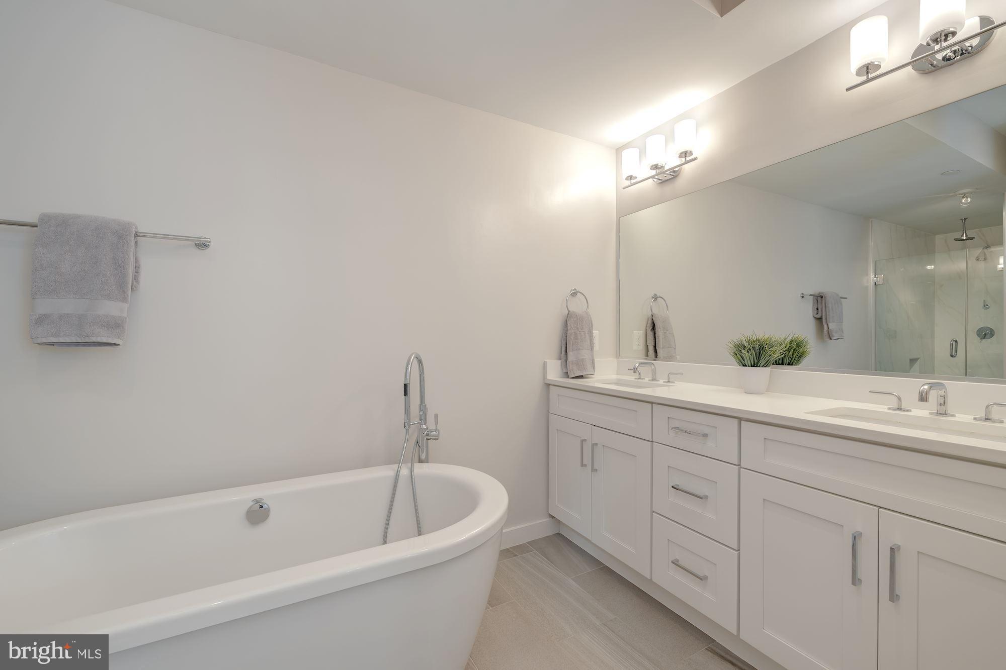 3915 Fulton Street Northwest, Unit 1 Washington, DC 20007 - Photo 22 of 33 Primary bath w/ dual vanity & slipper tub