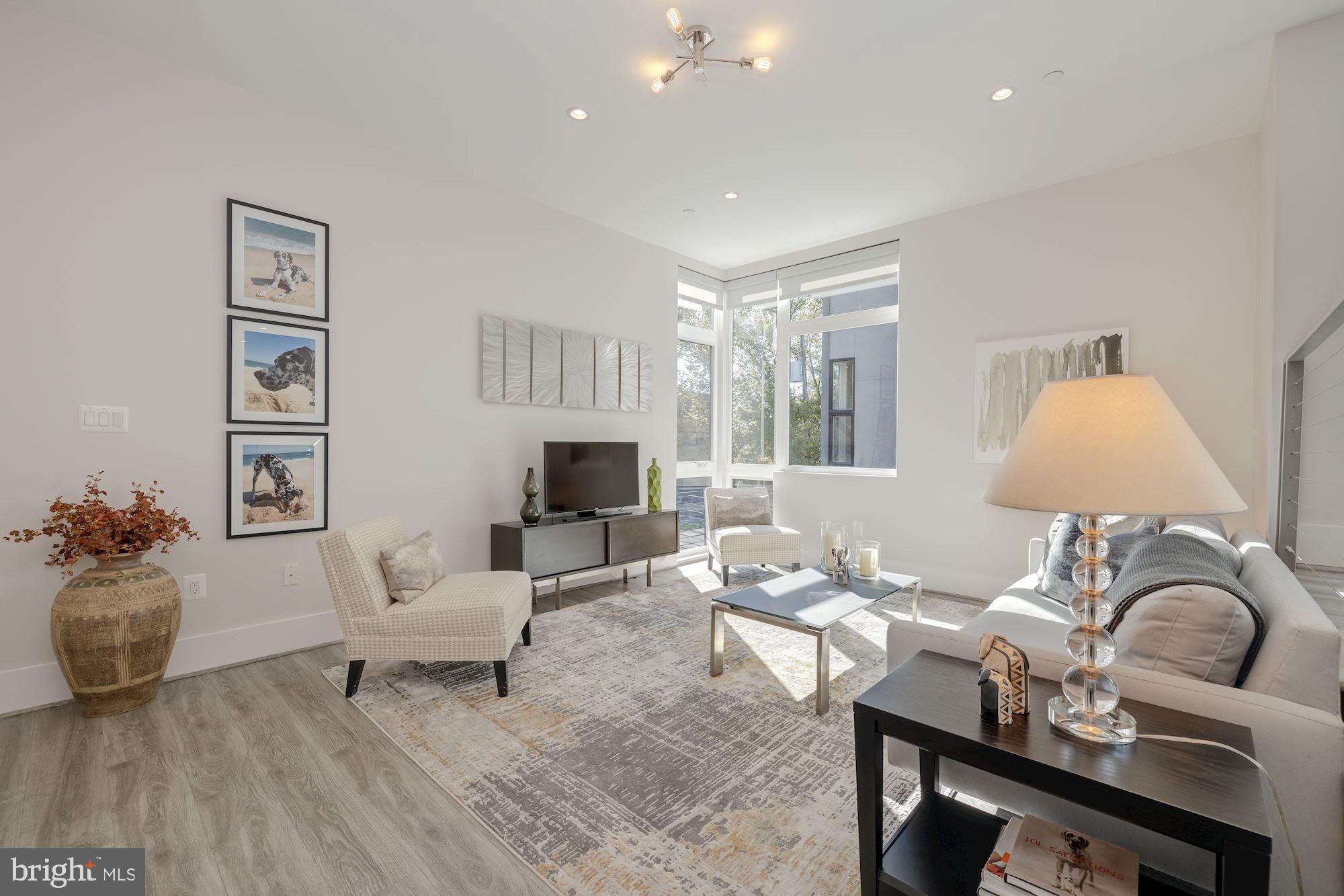 3915 Fulton Street Northwest, Unit 1 Washington, DC 20007 - Photo 5 of 33 Expansive windows...