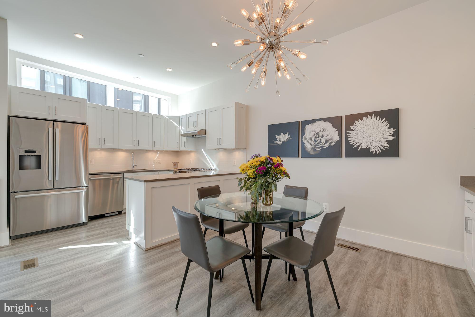 3915 Fulton Street Northwest, Unit 1 Washington, DC 20007 - Photo 9 of 33 Dining room features Kuel's Sputnik chandelier