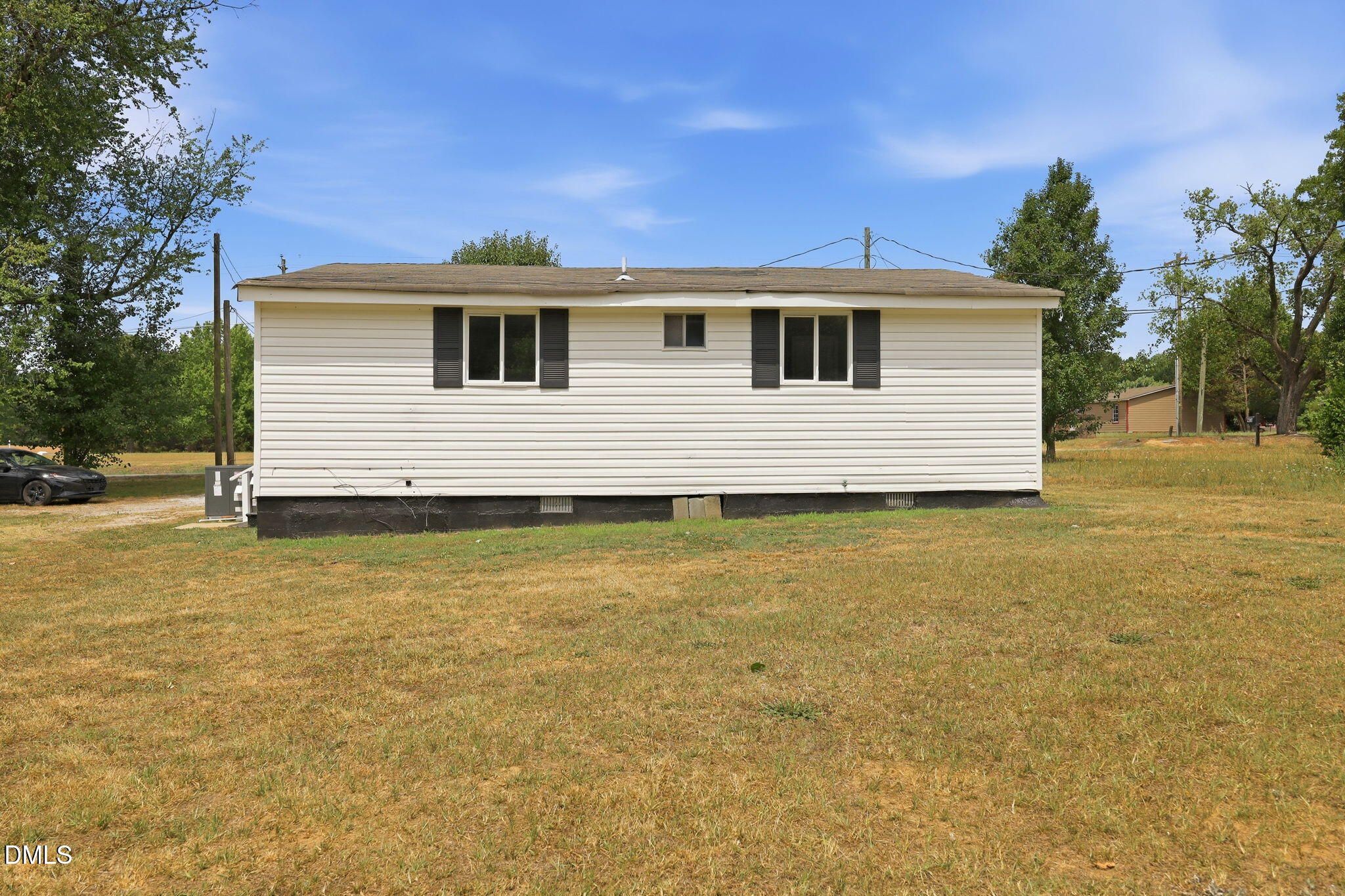 1758 Barber Mill Road Clayton, NC 27520 - Photo 26 of 41 a front view of a house with a yard