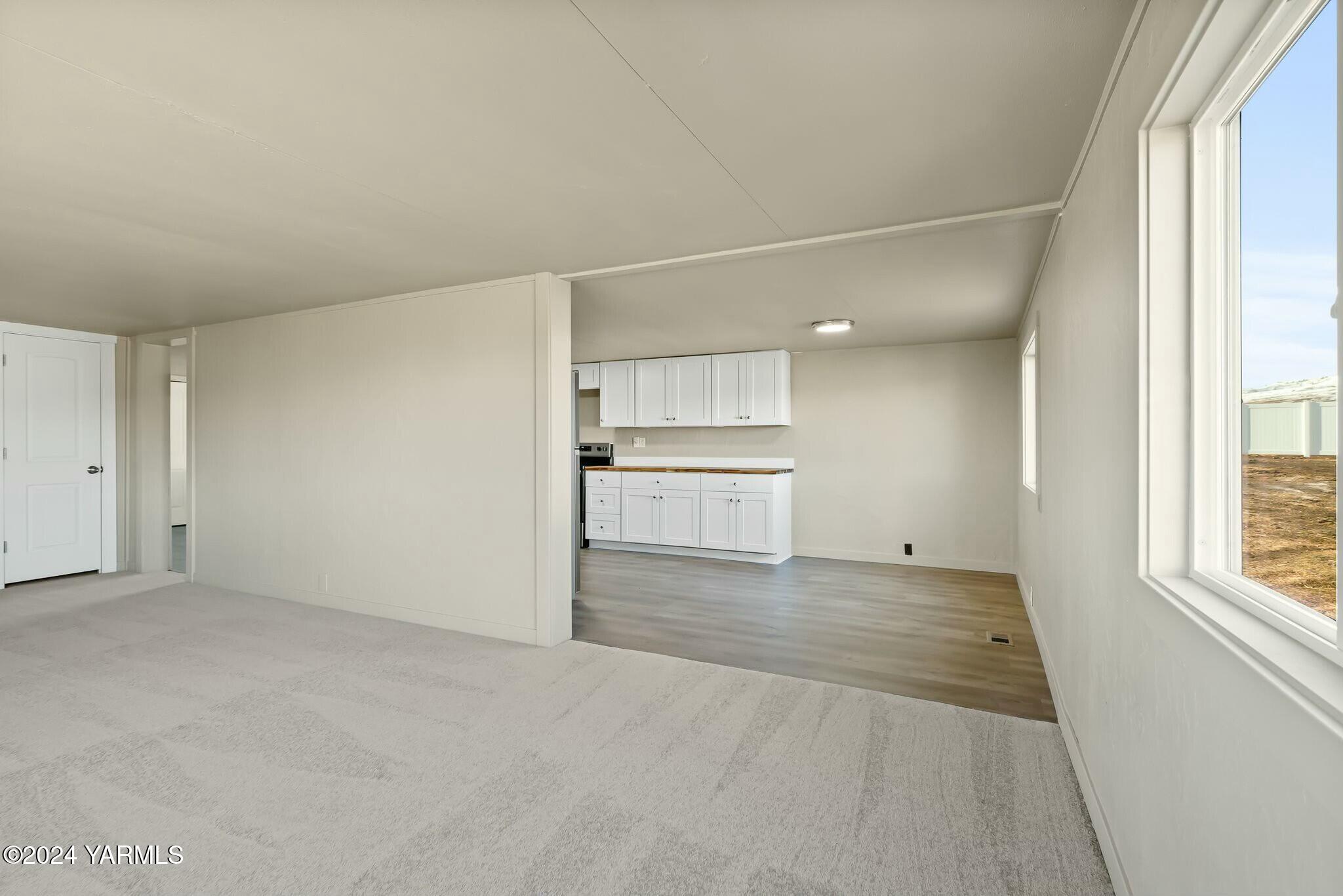 590 Hideaway Road Yakima, WA 98908 - Photo 7 of 34 a view of an empty room with a window