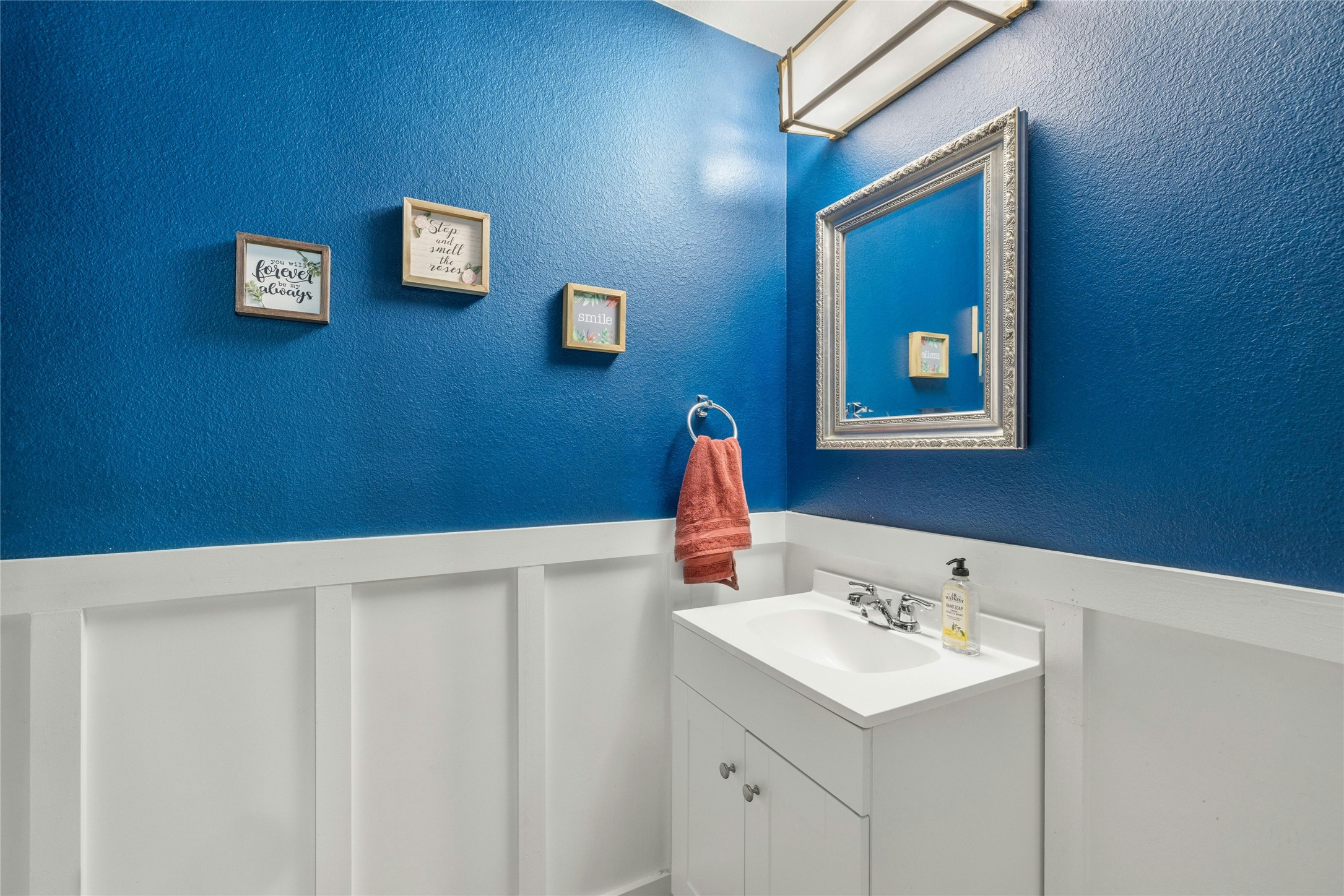104 Bufflehead Lane Leander, TX 78641 - Photo 15 of 34 Bathroom with a textured wall and vanity