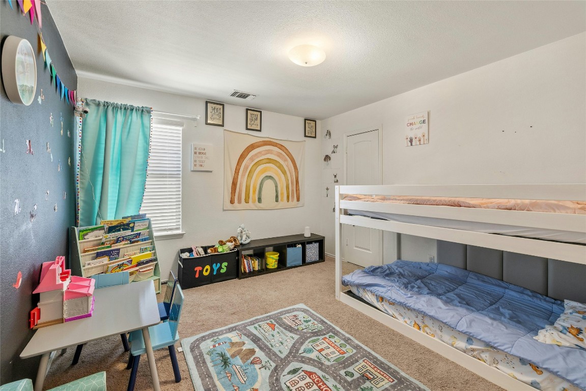 104 Bufflehead Lane Leander, TX 78641 - Photo 18 of 34 a living room with furniture and a table