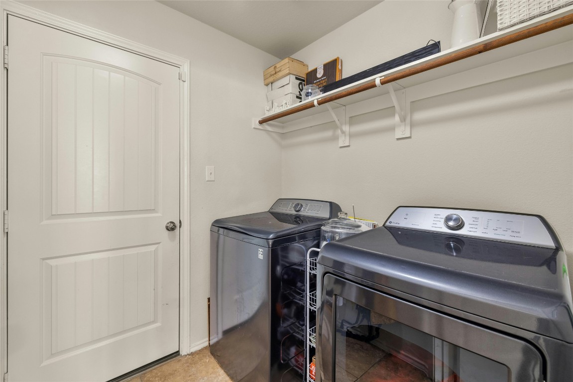 104 Bufflehead Lane Leander, TX 78641 - Photo 22 of 34 a utility room with dryer and washer