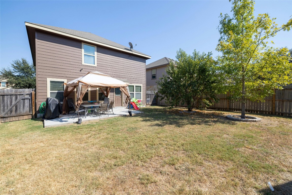 104 Bufflehead Lane Leander, TX 78641 - Photo 24 of 34 a view of a house with backyard porch and sitting area