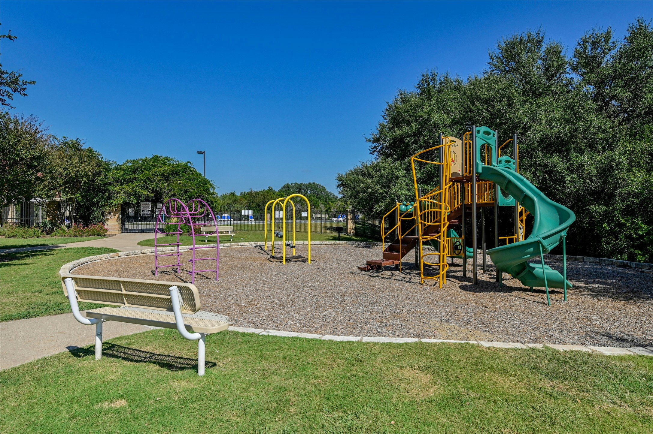 104 Bufflehead Lane Leander, TX 78641 - Photo 26 of 34 Community play area featuring a yard