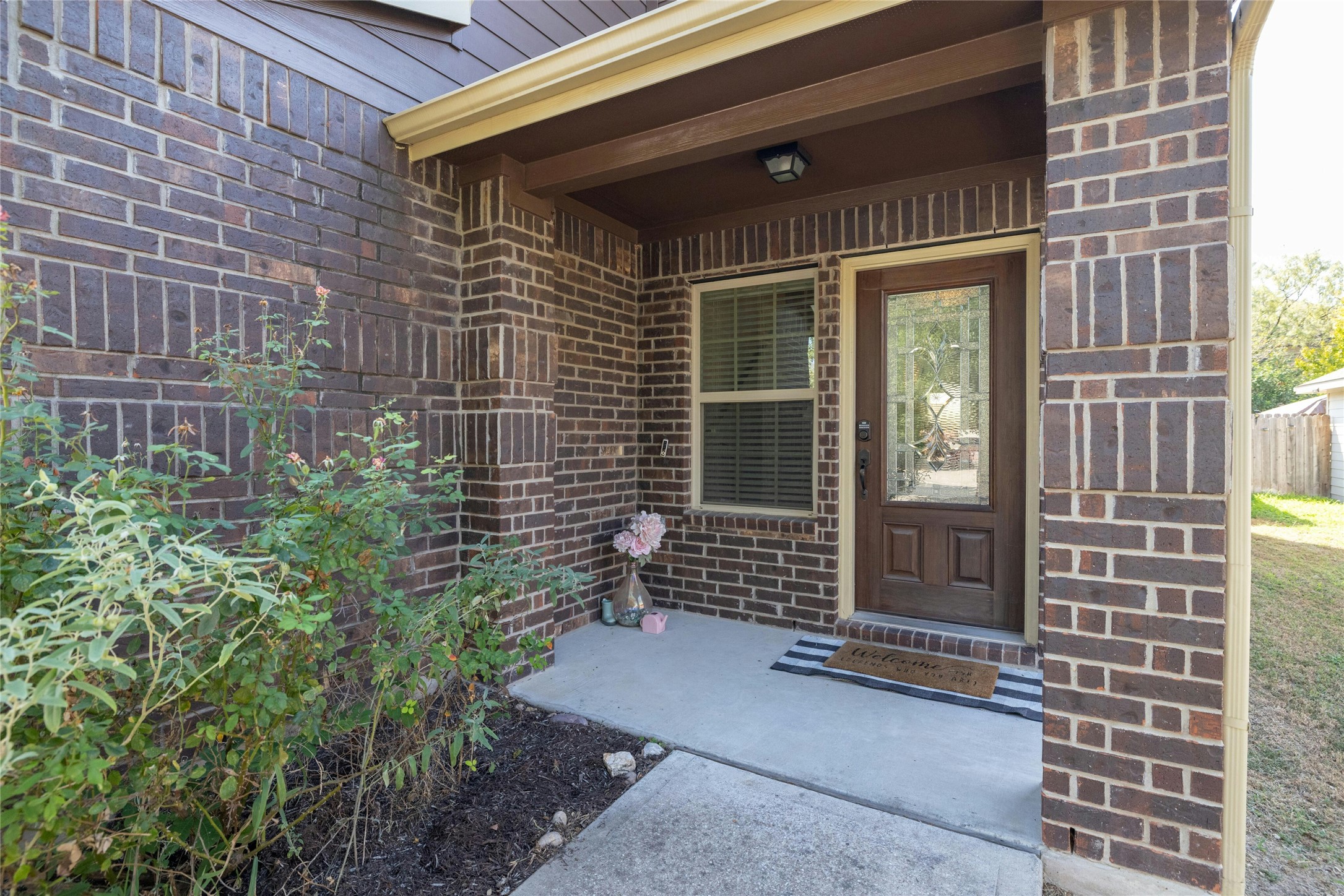 104 Bufflehead Lane Leander, TX 78641 - Photo 3 of 34 View of exterior entry featuring brick siding and covered porch