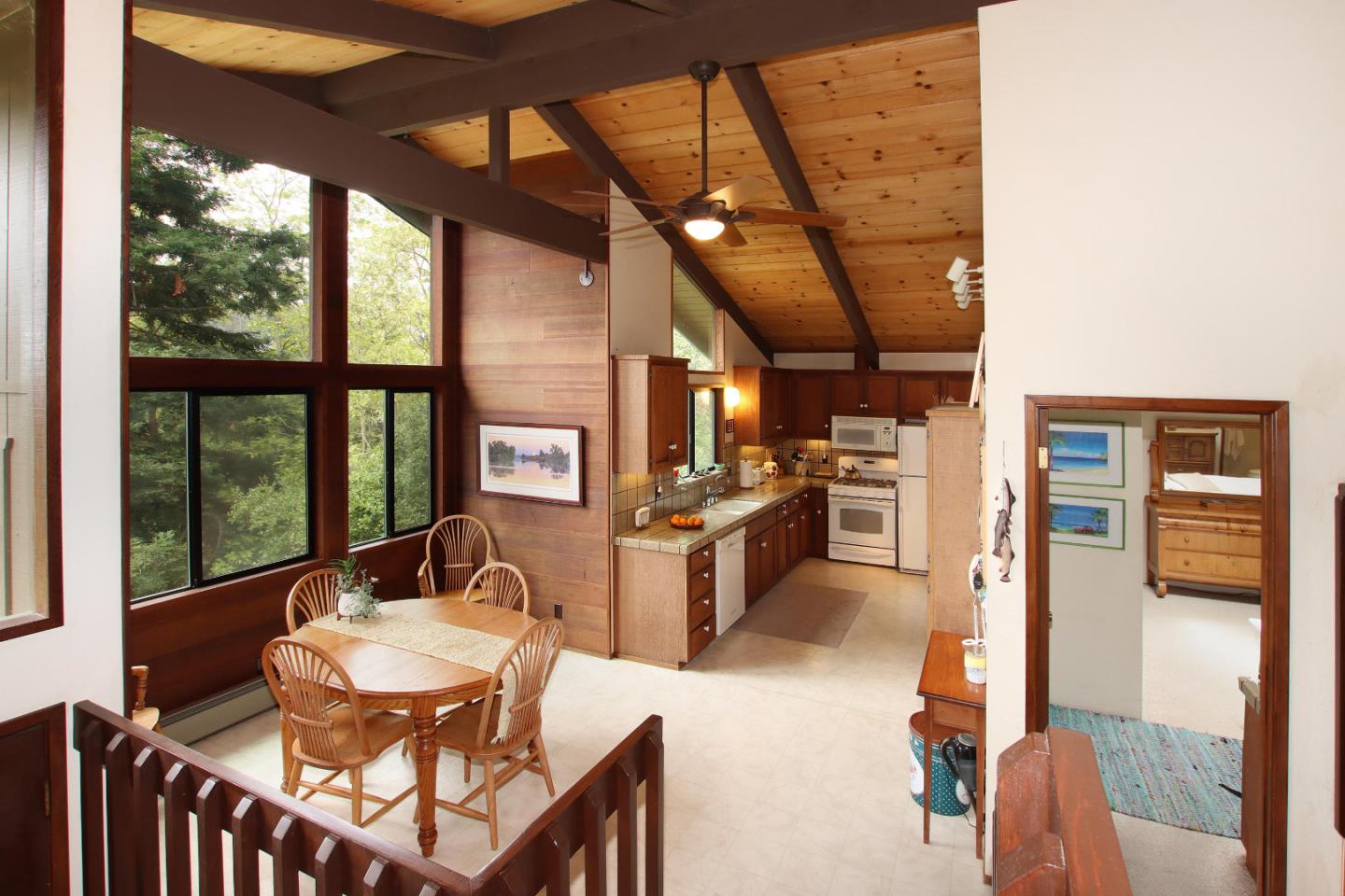 17 Pleasant Heights Drive Aptos, CA 95003 - Photo 13 of 21 a dining room with furniture and a floor to ceiling window