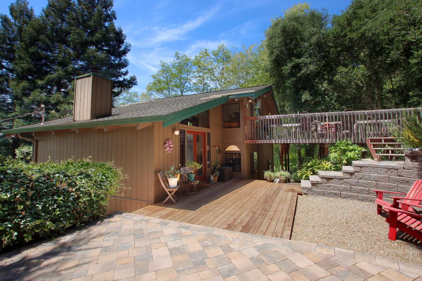 17 Pleasant Heights Drive Aptos, CA 95003 - Photo 3 of 21 a backyard of a house with potted plants and seating space