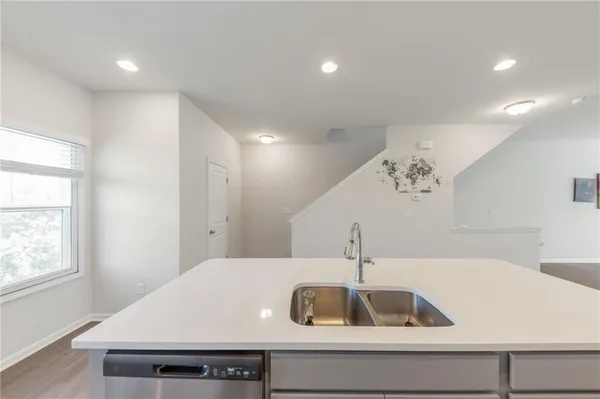 a view of a center island and kitchen