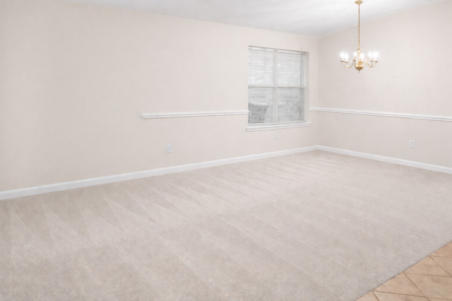 3522 Brackenfern Road Katy, TX 77449 - Photo 3 of 17 an empty room with chandelier fan