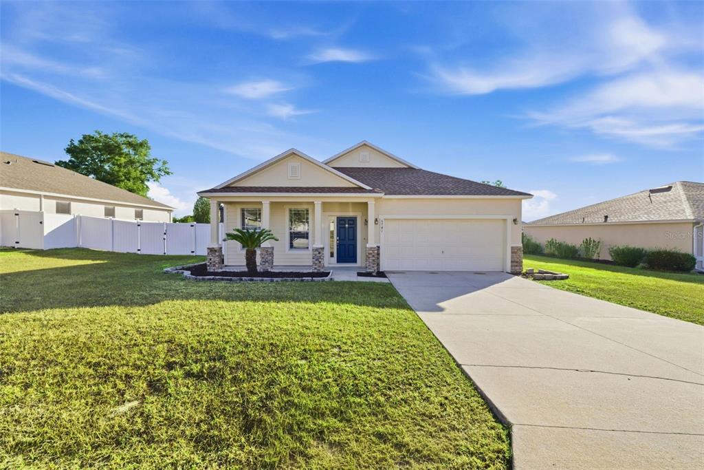 6741 Southwest 64th Terrace Ocala, FL 34476 - Photo 1 of 1 a view of house with garden and patio