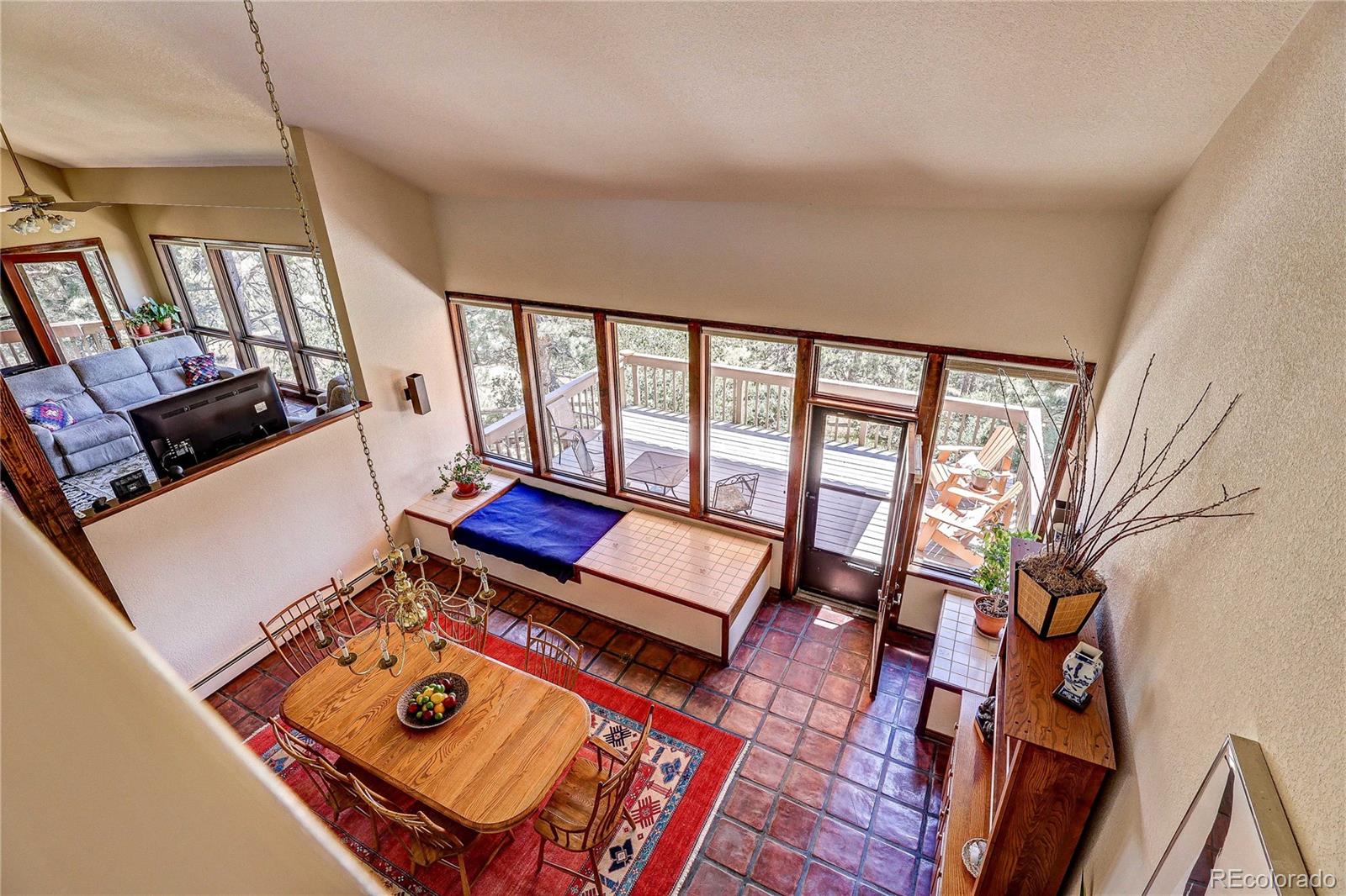 147 Alpine Avenue Golden, CO 80401 - Photo 24 of 47 a living room with furniture and a floor to ceiling window