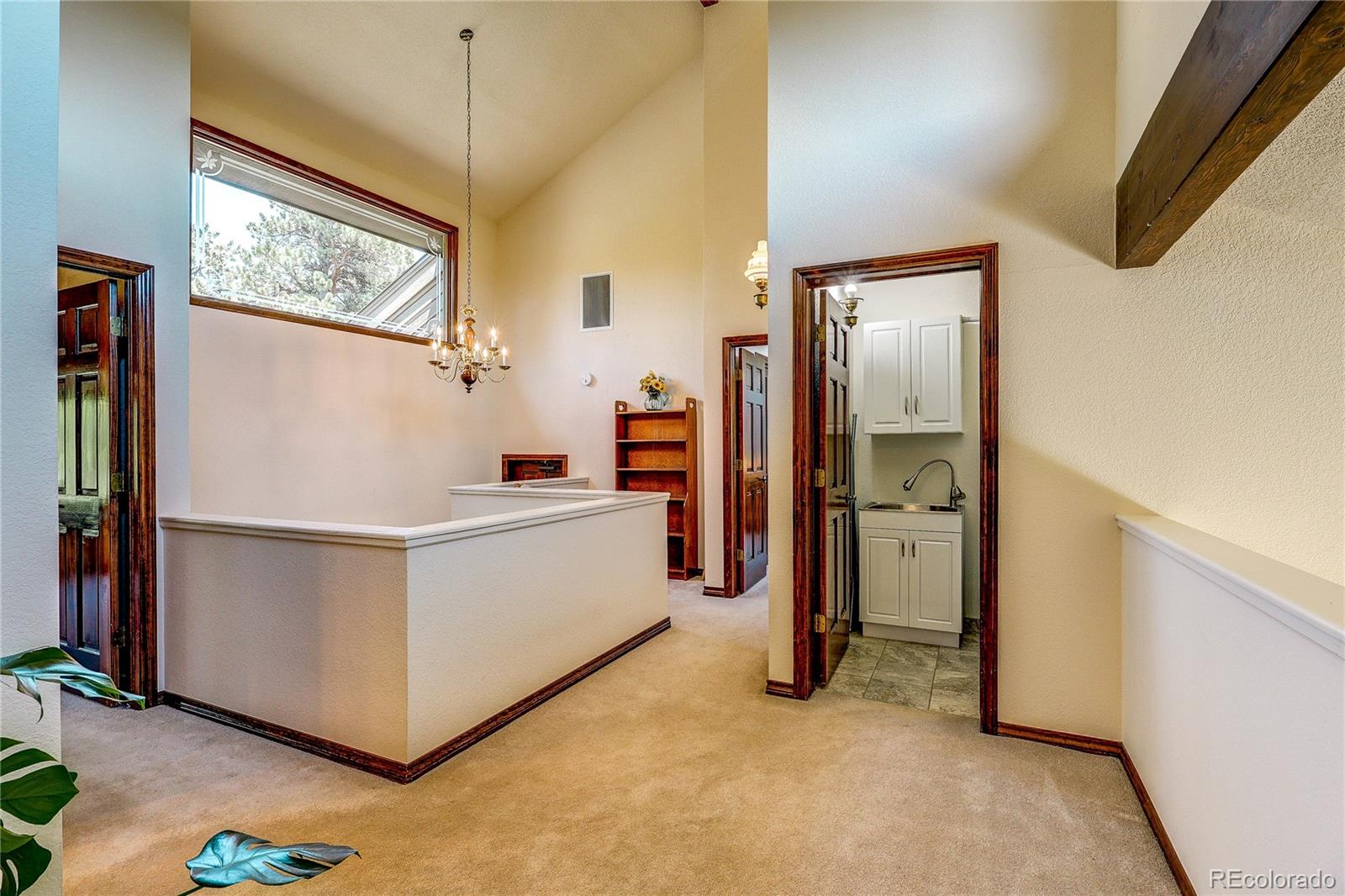 147 Alpine Avenue Golden, CO 80401 - Photo 25 of 47 a room with furniture a washer and dryer