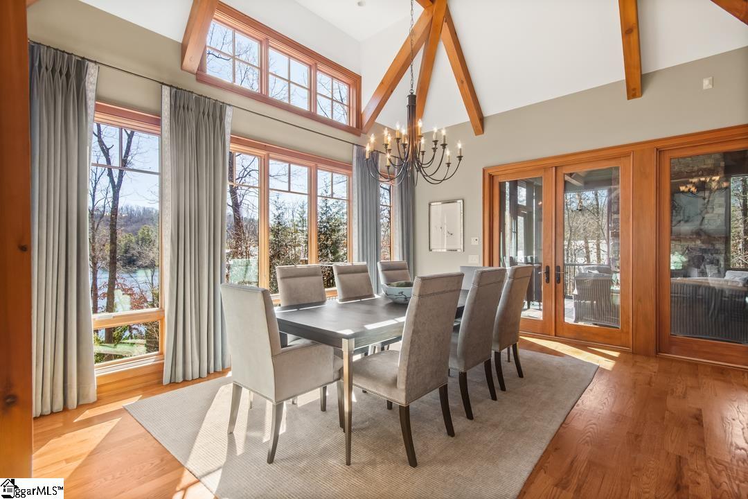 206 Feather Bell Lane Sunset, SC 29685 - Photo 11 of 50 The bright dining area features expansive views of the outdoors, ideal for memorable gatherings.
