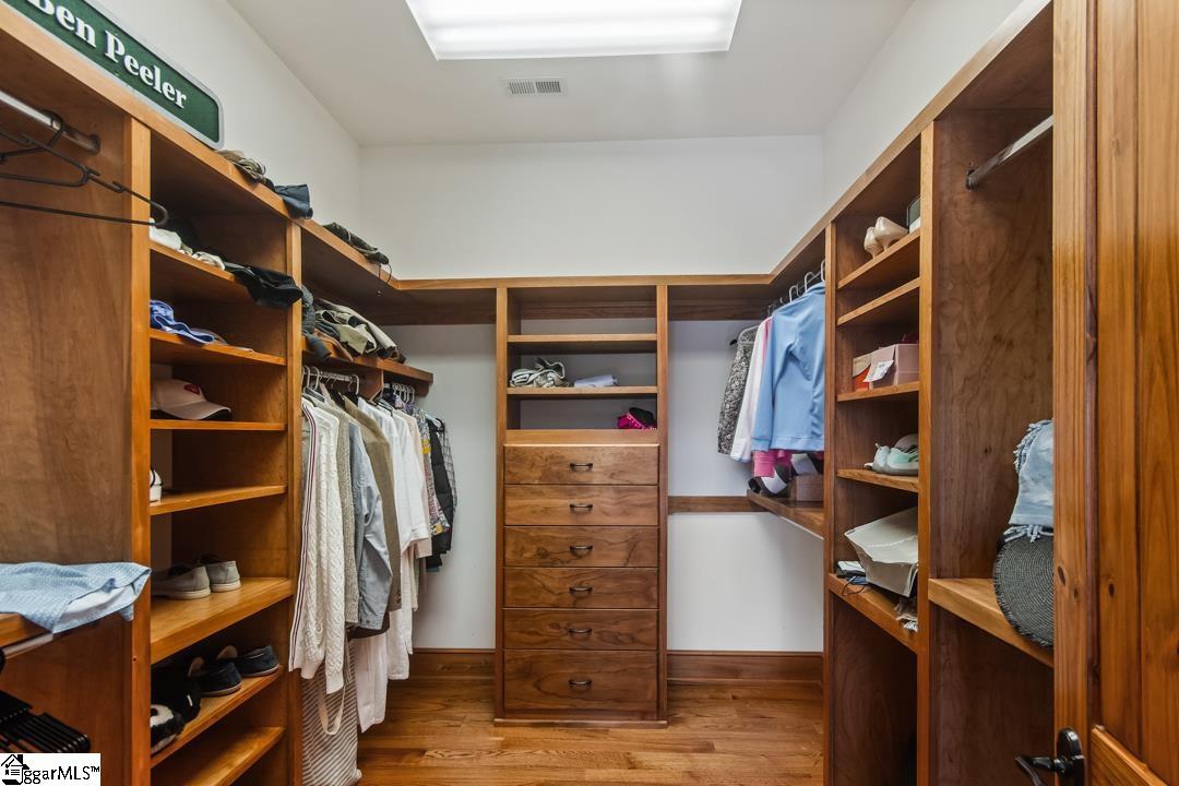 206 Feather Bell Lane Sunset, SC 29685 - Photo 23 of 50 This custom-designed closet offers abundant storage and seamless organization for your wardrobe.