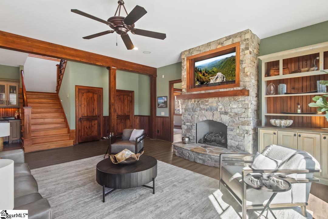 206 Feather Bell Lane Sunset, SC 29685 - Photo 29 of 50 An inviting living space features natural wood accents and a captivating stone fireplace.