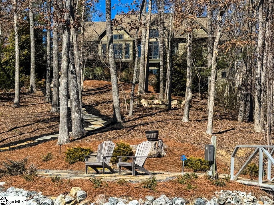 206 Feather Bell Lane Sunset, SC 29685 - Photo 44 of 50 This secluded residence offers ample outdoor leisure space within a natural wooded setting.