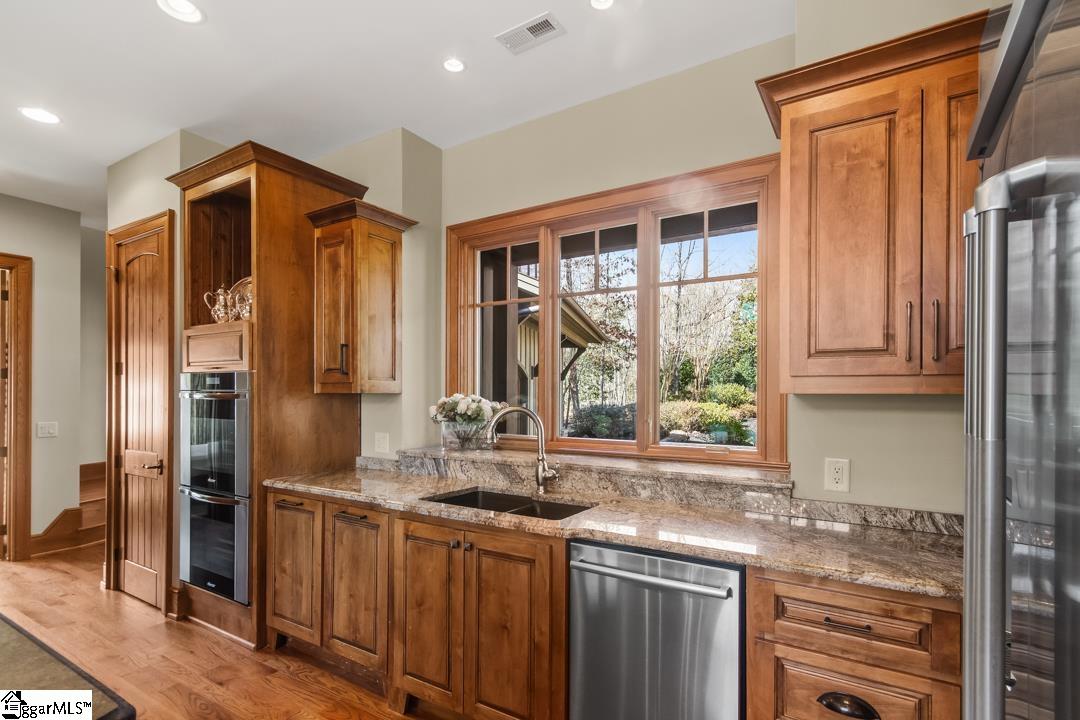 206 Feather Bell Lane Sunset, SC 29685 - Photo 9 of 50 The kitchen offers a practical layout and ample cabinetry, perfect for any culinary endeavor.