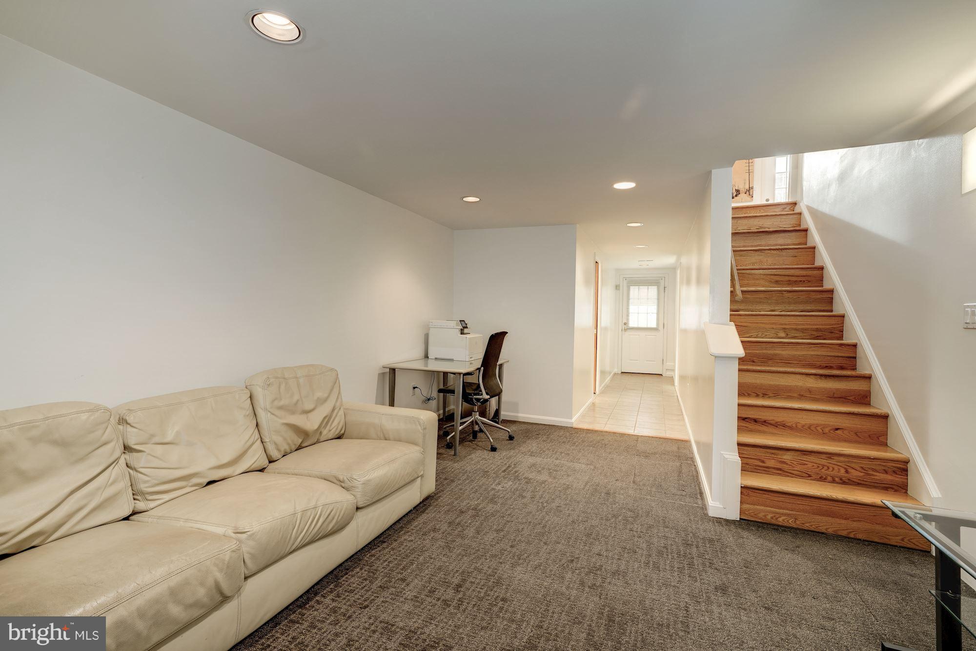 5606 Chesterbrook Road Bethesda, MD 20816 - Photo 19 of 29 Recreation Room opens to side entrance to deck