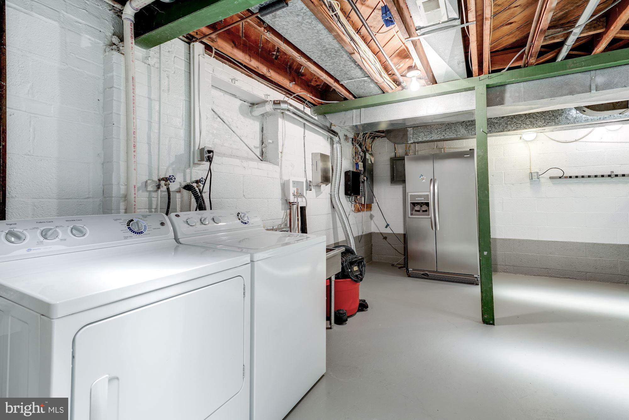 5606 Chesterbrook Road Bethesda, MD 20816 - Photo 25 of 29 Utility Room with washer/dryer