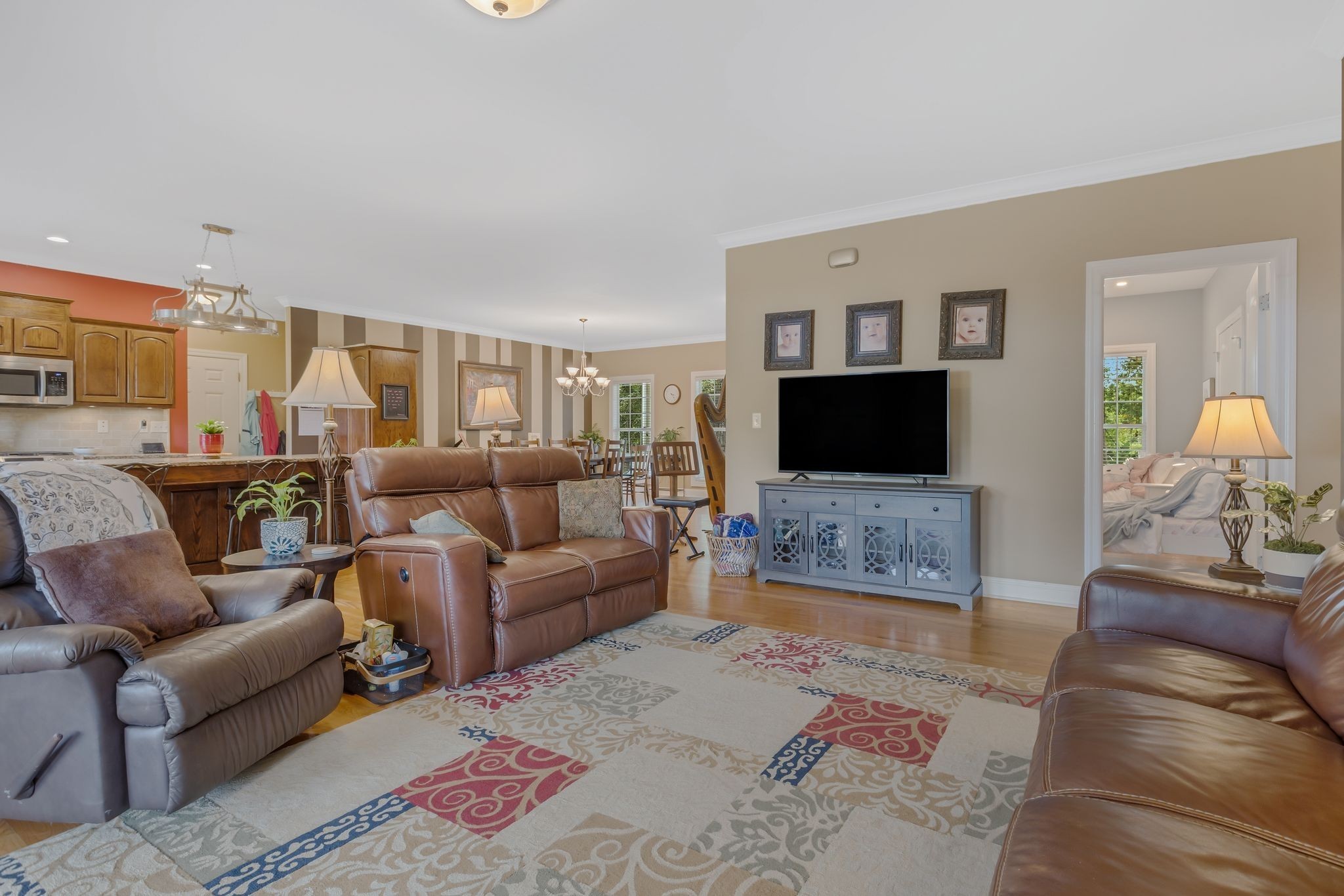 2350 Joe Brown Road Spring Hill, TN 37174 - Photo 31 of 80 a living room with furniture and a flat screen tv