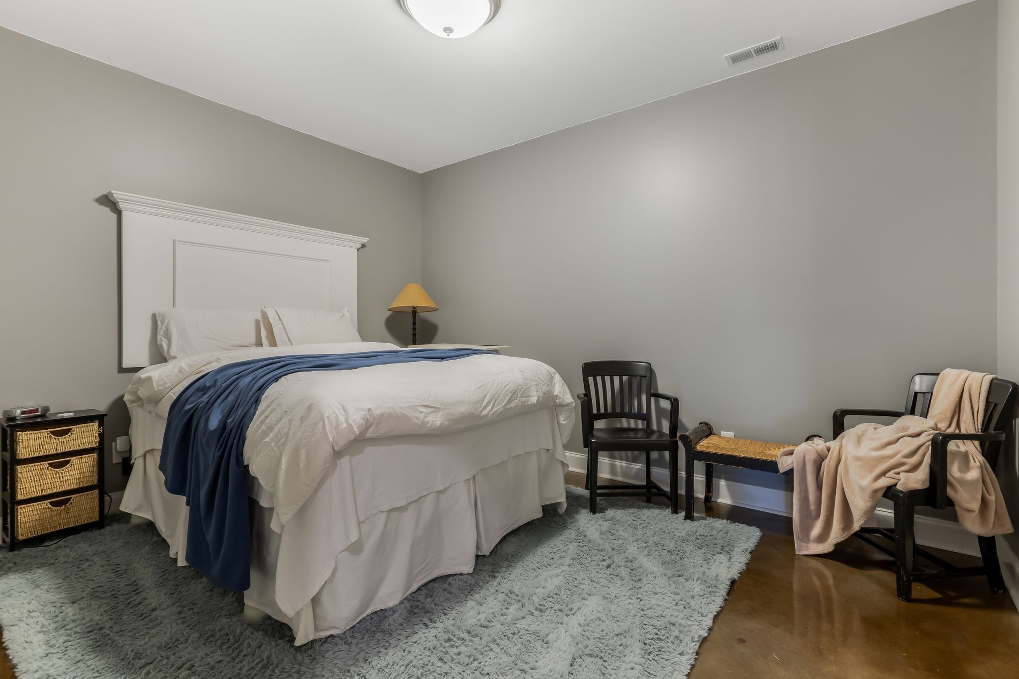 2350 Joe Brown Road Spring Hill, TN 37174 - Photo 45 of 80 a spacious bedroom with a bed and a chair
