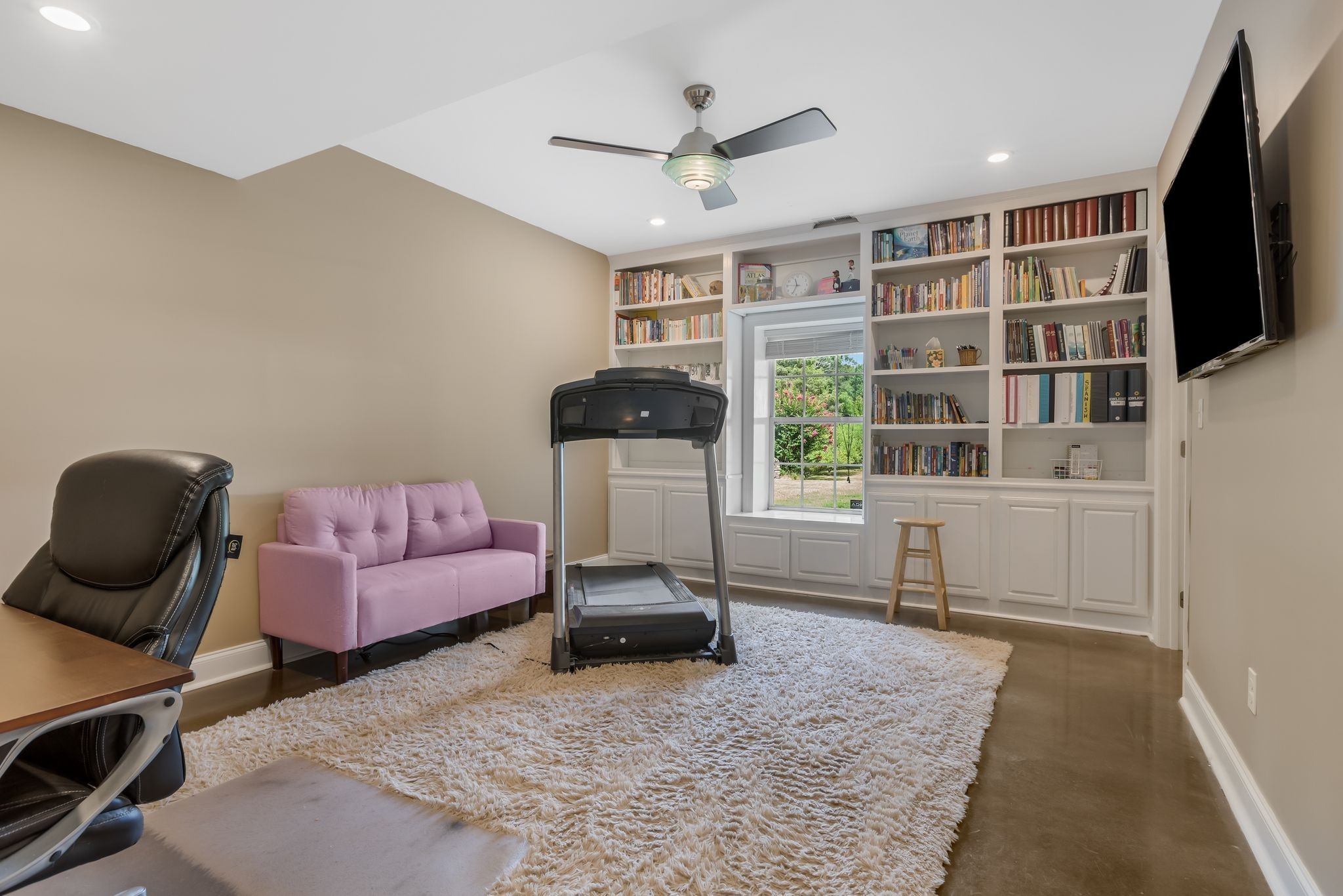 2350 Joe Brown Road Spring Hill, TN 37174 - Photo 47 of 80 a living room with furniture a window and a flat screen tv