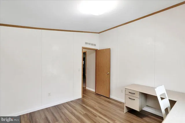 a bathroom with a bathtub and a sink