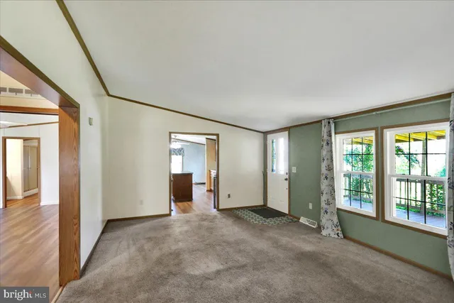 an empty room with windows