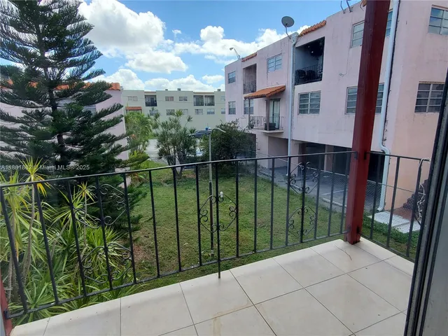 a view of a balcony with lake view