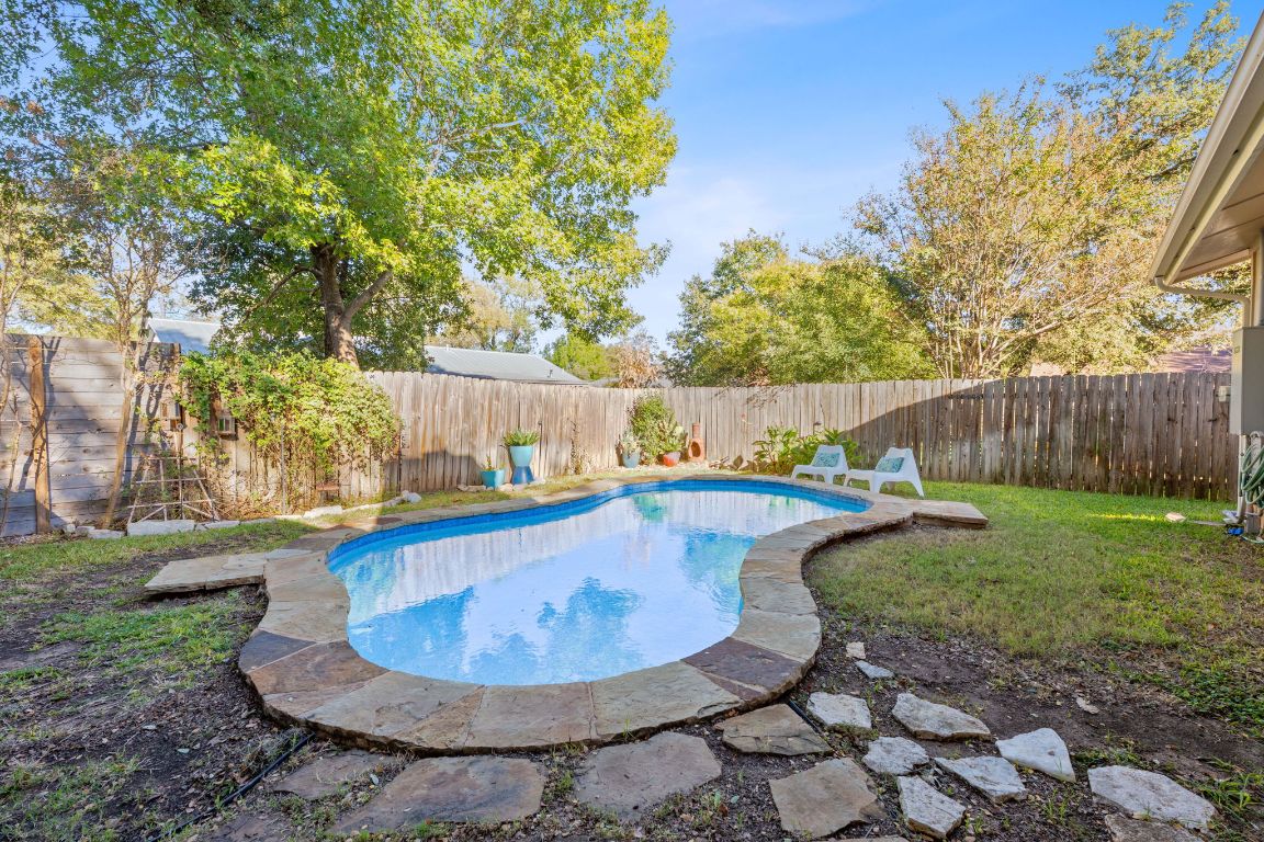 4706 Cap Rock Drive Austin, TX 78735 - Photo 25 of 40 a view of a swimming pool with a patio