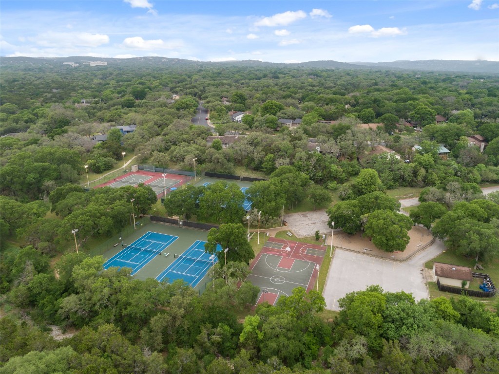 4706 Cap Rock Drive Austin, TX 78735 - Photo 38 of 40 an aerial view of residential houses with outdoor space and trees