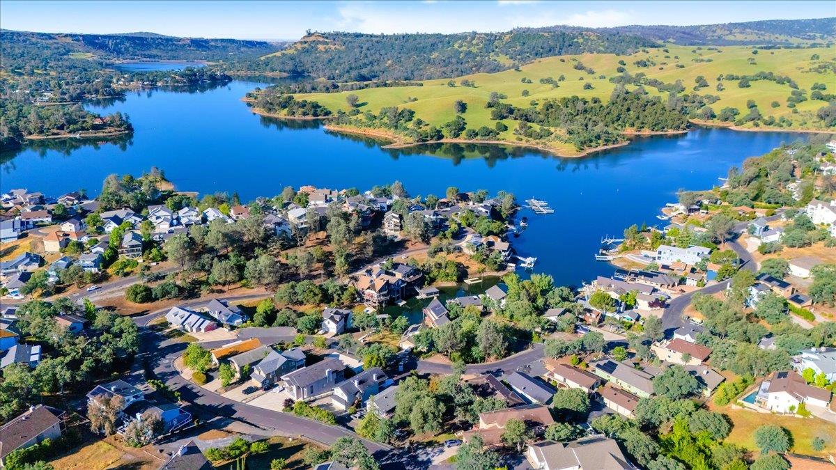 564 Dolores Way Copperopolis, CA 95228 - Photo 12 of 35 a view of a lake with a mountain in the background