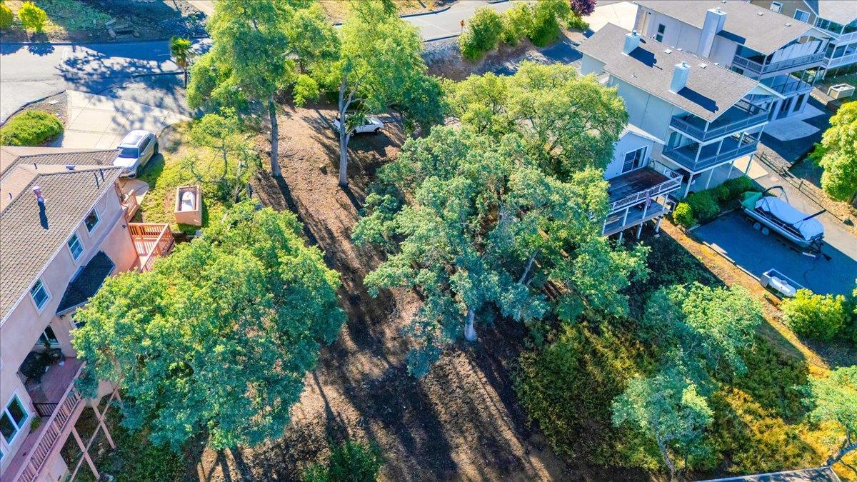 564 Dolores Way Copperopolis, CA 95228 - Photo 9 of 35 an aerial view of multi story residential houses with outdoor space and trees
