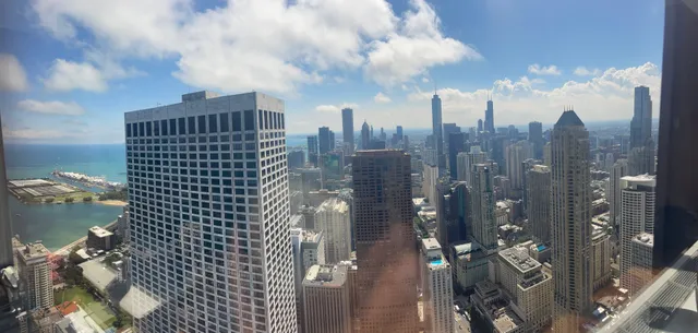 a view of a city with tall buildings