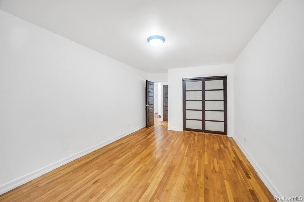 3123 Bailey Avenue, Unit 4A Bronx, NY 10463 - Photo 9 of 27 a view of wooden floor in a room
