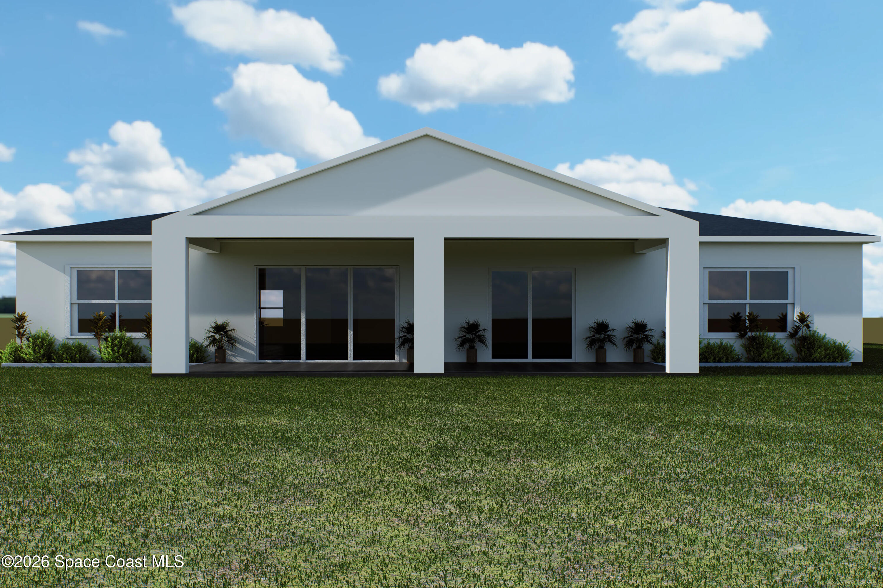 0 Hazel Lane Malabar, FL 32950 - Photo 11 of 17 a view of a white house with a big yard and large trees