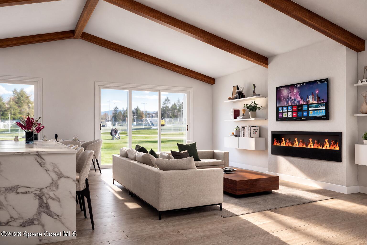 0 Hazel Lane Malabar, FL 32950 - Photo 6 of 17 a living room with furniture and a flat screen tv