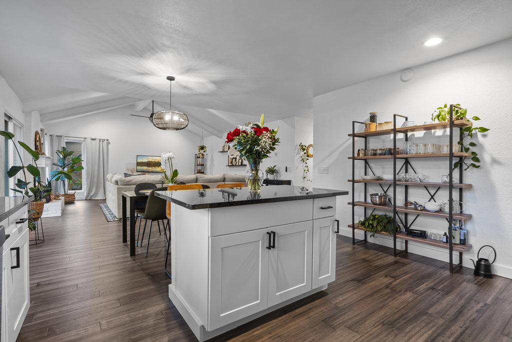 9308 Meadowheath Drive Austin, TX 78729 - Photo 17 of 40 a living room with furniture and wooden floor
