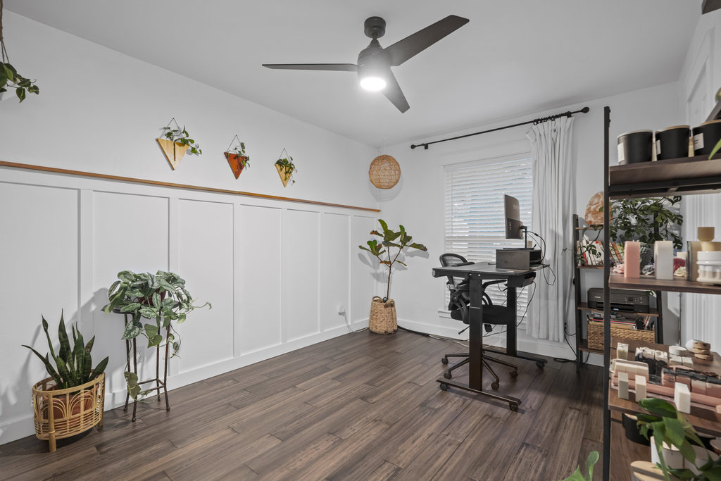 9308 Meadowheath Drive Austin, TX 78729 - Photo 27 of 40 a workspace with furniture window and wooden floor